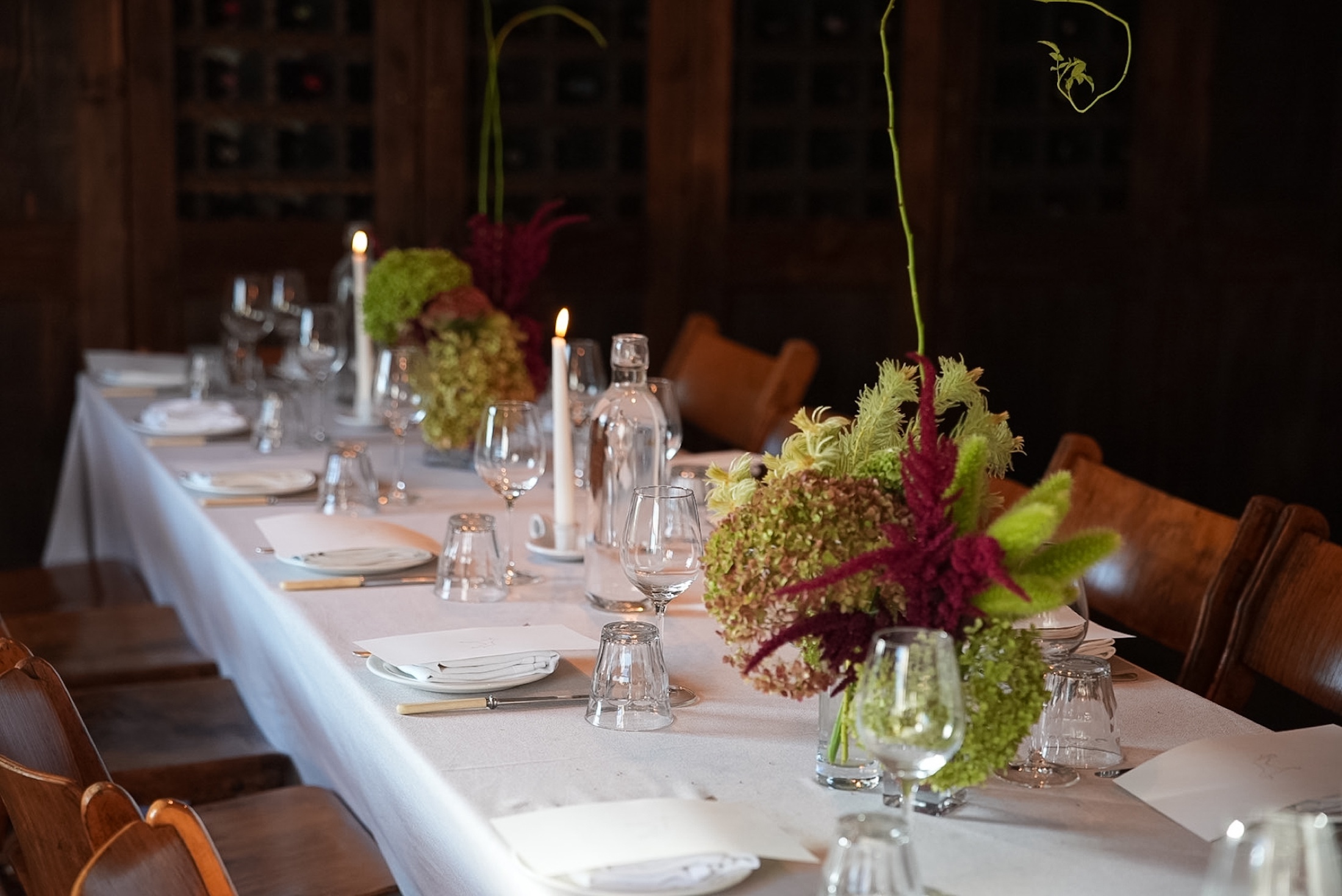 Candlelit floral table set for Zerion Supper Club London